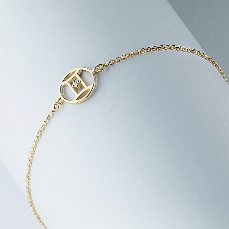 Браслет близнецы из желтого золота с бриллиантом