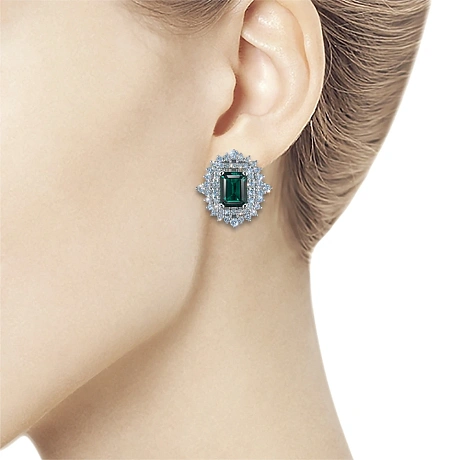 Серьги из комбинированного золота с и изумрудами