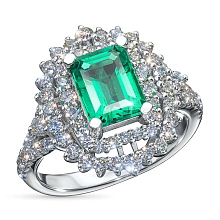 Кольцо из комбинированного золота с и изумрудом и бриллиантами