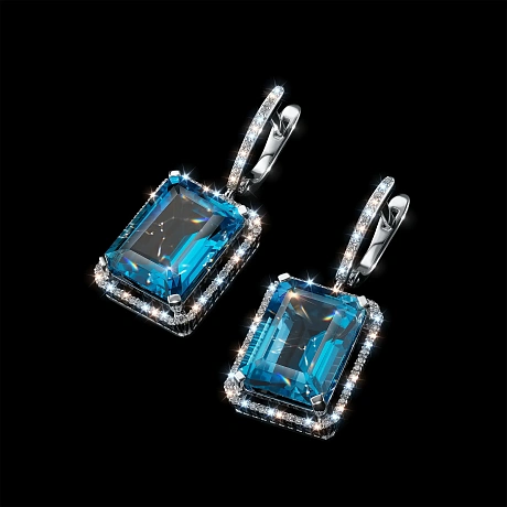 Серьги из комбинированного золота с и топазами