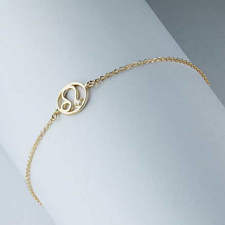 Браслет лев из желтого золота с бриллиантом