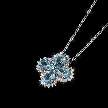 Подвеска из комбинированного золота с и топазами