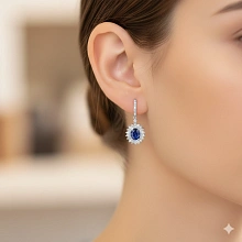 Серьги из комбинированного золота с и сапфирами и бриллиантами