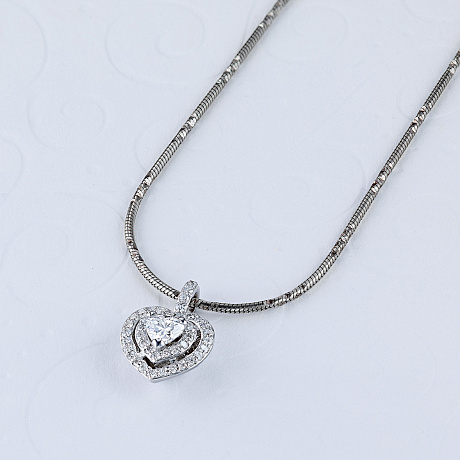 Подвеска из комбинированного золота с бриллиантами