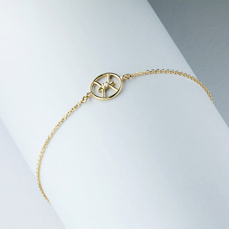 Браслет рыба из желтого золота с бриллиантом