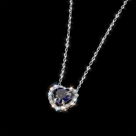 Подвеска из комбинированного золота с и сапфиром