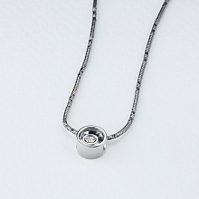 Подвеска из комбинированного золота с бриллиантом