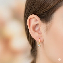 Серьги из желтого золота с бриллиантом