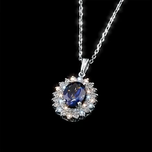 Подвеска из комбинированного золота с и сапфиром и бриллиантами