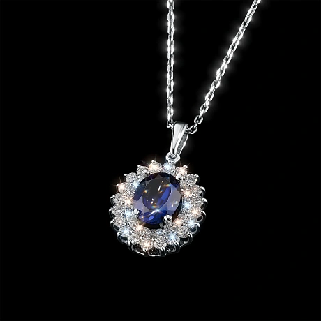 Подвеска из комбинированного золота с и сапфиром