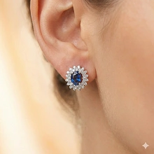 Серьги из комбинированного золота с и сапфирами и бриллиантами