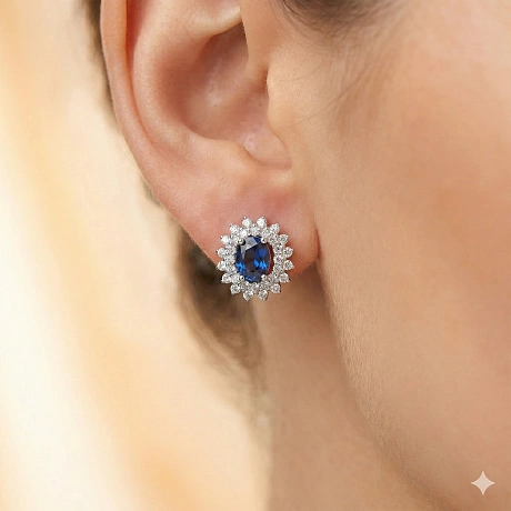 Серьги из комбинированного золота с и сапфирами