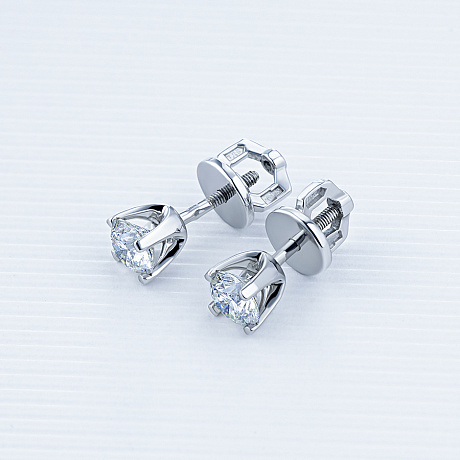 Пусеты из комбинированного золота с бриллиантами