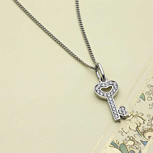 Подвеска из комбинированного золота с бриллиантами