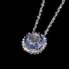 Подвеска из комбинированного золота с и танзанитом и бриллиантами