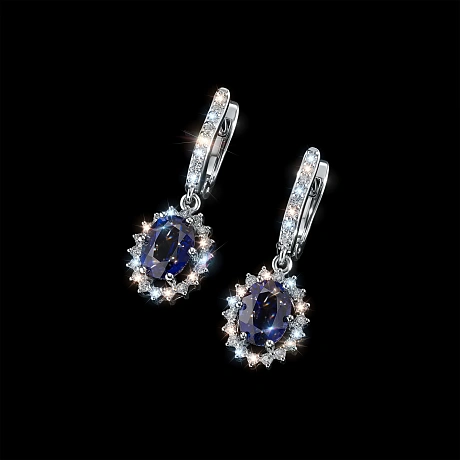 Серьги из комбинированного золота с и сапфирами
